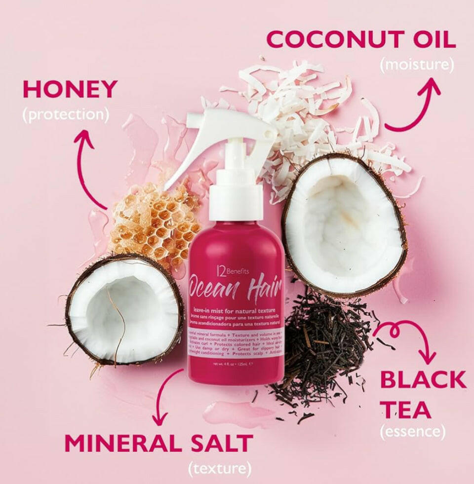 A pink spray bottle labeled '12 Benefits Ocean Hair' designed for creating natural textured hair.