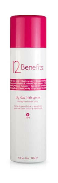 A can of 12 Benefits Big Day Hairspray with a pink cap and white label, displaying the product name and benefits.